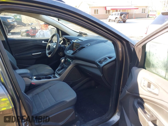 2015 Ford Escape SE with VIN 1FMCU9GX6FUB35649, listed as a IAAI auction lot 42055398 with 128,524 mi miles. Bid and sale history available at carsss.com. Image 5.