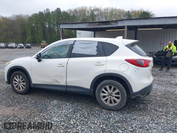 2015 Mazda CX-5 Touring with VIN JM3KE2CY4F0436664, listed as a IAAI auction lot 41876238 with 374,305 mi miles. Bid and sale history available at carsss.com. Image 14.