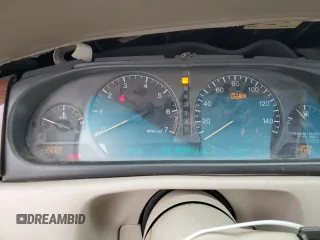 2000 Cadillac Eldorado with VIN 1G6EL12Y5YU166723, listed as a Copart auction lot 82612034 with 80,839 mi miles and Salvage title. Bid and sale history available at DreamBid. Image 9.