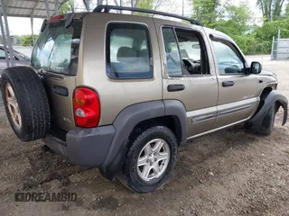 2003 Jeep Liberty Sport z VIN 1J4GK48K63W602709, wystawiony jako IAAI lot #42176496 z przebiegiem 151 397 mil mil oraz . Historia ofert i sprzedaży dostępna na DreamBid. Obrazek 4.