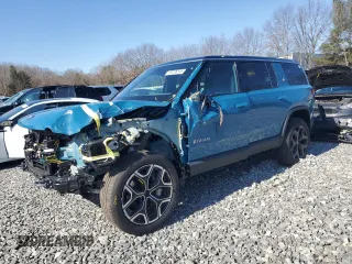2024 Rivian R1S Adventure with VIN 7PDSGCBA7RN037664, listed as a Copart auction lot 49236015 with 16,496 mi miles and Salvage Title. Bid and sale history available at carsss.com. Image 1.