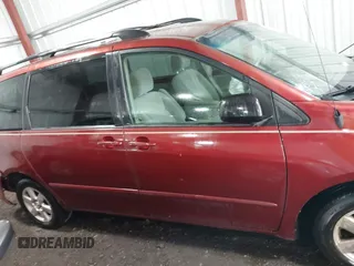 2009 Toyota Sienna CE with VIN 5TDZK23C89S265150, listed as a IAAI auction lot 42079867 with 211,467 mi miles. Bid and sale history available at carsss.com. Image 13.