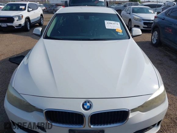 2015 BMW 3 Series 320i with VIN WBA3B1G5XFNT05903, listed as a IAAI auction lot 42063574 with Not Provided miles. Bid and sale history available at carsss.com. Image 6.