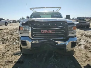 2019 GMC Sierra 1500 with VIN 2GD21NEG5K1135468, listed as a Copart auction lot 84956184 with 129,641 mi miles and Clean Title. Bid and sale history available at DreamBid. Image 14.