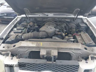 2003 Ford Explorer Sport Trac XLS z VIN 1FMZU67E63UC48939, wystawiony jako IAAI lot #42526151 z przebiegiem 221 402 mil mil oraz . Historia ofert i sprzedaży dostępna na DreamBid. Obrazek 10.