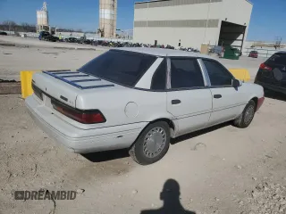 1992 Ford Tempo GL z VIN 2FAPP36XXNB207779, wystawiony jako Copart lot #49348685 z przebiegiem 526 491 mil mil oraz Tytuł czysty. Historia ofert i sprzedaży dostępna na DreamBid. Obrazek 3.