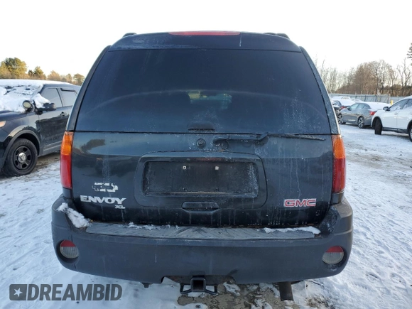 2004 GMC Envoy XL SLE with VIN 1GKET16S646125913, listed as a Copart auction lot 86113974 with 197,992 mi miles and Clean Title. Bid and sale history available at carsss.com. Image 6.