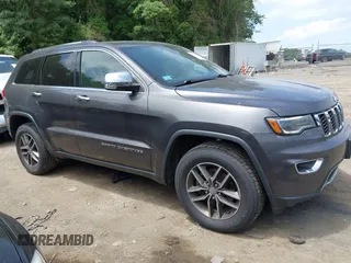 2018 Jeep Grand Cherokee Limited with VIN 1C4RJFBG7JC159065, listed as a IAAI auction lot 42610119 with 156,405 mi miles and . Bid and sale history available at DreamBid. Image 1.