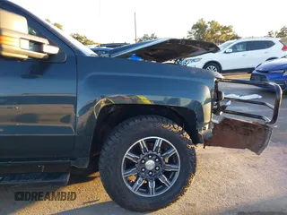 2018 Chevrolet Silverado 1500 Work Truck with VIN 3GCUKNEC8JG402700, listed as a IAAI auction lot 41015830 with 107,781 mi miles. Bid and sale history available at carsss.com. Image 21.