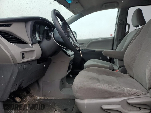 2017 Toyota Sienna L with VIN 5TDZZ3DC0HS779525, listed as a Copart auction lot 52687115 with 372,129 mi miles and Clean Title. Bid and sale history available at DreamBid. Image 7.