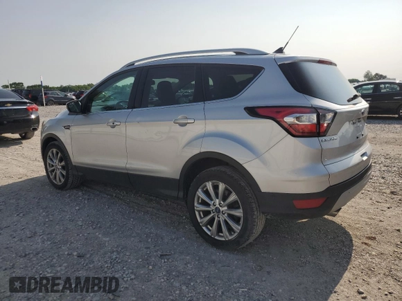 2018 Ford Escape Titanium z VIN 1FMCU0J95JUD44086, wystawiony jako Copart lot #58978865 z przebiegiem 90 874 mil mil oraz Szkoda całkowita • Salvage title. Historia ofert i sprzedaży dostępna na DreamBid. Obrazek 2.