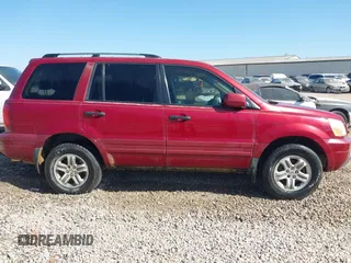 2005 Honda Pilot EX-L with VIN 5FNYF18505B022497, listed as a IAAI auction lot 41994385 with 199,143 mi miles. Bid and sale history available at carsss.com. Image 13.
