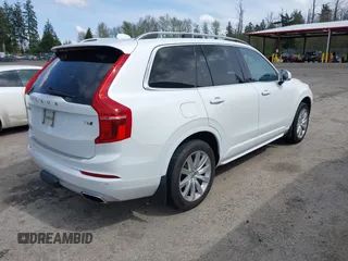 2016 Volvo XC90 T6 Momentum with VIN YV4A22PK8G1043665, listed as a IAAI auction lot 42004230 with 156,681 mi miles. Bid and sale history available at carsss.com. Image 4.