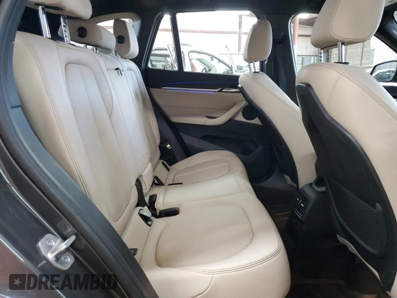 2021 BMW X1 xDrive28i with VIN WBXJG9C00M5S35249, listed as a Copart auction lot 61895775 with 34,641 mi miles and Salvage title. Bid and sale history available at DreamBid. Image 11.