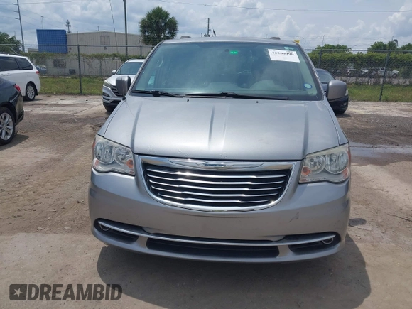 2016 Chrysler Town & Country Touring with VIN 2C4RC1BG4GR193462, listed as a IAAI auction lot 42200990 with 140,430 mi miles. Bid and sale history available at carsss.com. Image 12.