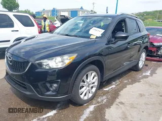 2013 Mazda CX-5 Grand Touring with VIN JM3KE4DE6D0148030, listed as a IAAI auction lot 42082947 with 119,432 mi miles and . Bid and sale history available at DreamBid. Image 18.