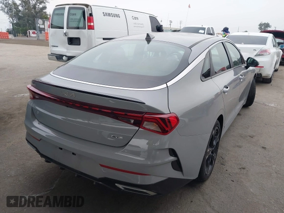 2023 Kia K5 GT-Line z VIN 5XXG64J27PG199321, wystawiony jako IAAI lot #42153677 z przebiegiem 28 798 mil mil oraz . Historia ofert i sprzedaży dostępna na DreamBid. Obrazek 4.