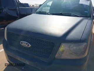 2004 Ford F-150 STX with VIN 1FTRX12W74NA67018, listed as a IAAI auction lot 41978597 with Not provided miles and . Bid and sale history available at DreamBid. Image 10.