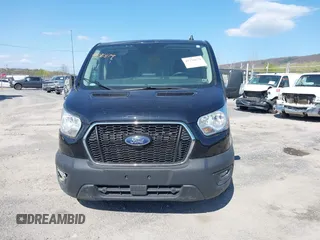 2021 Ford Transit Cargo with VIN 1FTYE1Y85MKA34465, listed as a IAAI auction lot 41736879 with 77,215 mi miles. Bid and sale history available at carsss.com. Image 12.