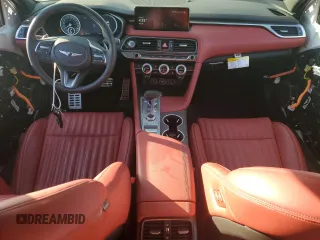 2023 Genesis G70 2.0T with VIN KMTG34TA1PU134120, listed as a Copart auction lot 77657374 with 12,024 mi miles and Salvage Title. Bid and sale history available at DreamBid. Image 8.