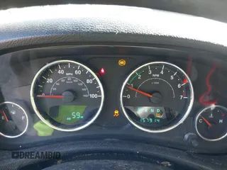 2012 Jeep Wrangler Unlimited Sport z VIN 1C4BJWDG1CL220511, wystawiony jako IAAI lot #42227037 z przebiegiem 157 914 mil mil oraz . Historia ofert i sprzedaży dostępna na DreamBid. Obrazek 7.