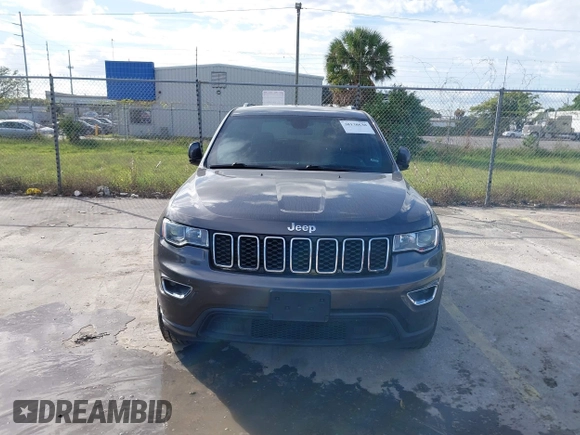2018 Jeep Grand Cherokee Altitude with VIN 1C4RJFAG9JC459143, listed as a IAAI auction lot 38138630 with 71,150 mi miles and . Bid and sale history available at DreamBid. Image 6.