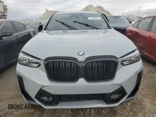 2022 BMW X4 M z VIN 5YM23EC08N9J85904, wystawiony jako Copart lot #41979823 z przebiegiem Nie podano mil oraz . Historia ofert i sprzedaży dostępna na DreamBid. Obrazek 5.