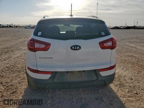 2012 Kia Sportage LX z VIN KNDPBCA22C7261796, wystawiony jako Copart lot #57284425 z przebiegiem 133 383 mil mil oraz Szkoda całkowita • Salvage title. Historia ofert i sprzedaży dostępna na DreamBid. Obrazek 6.