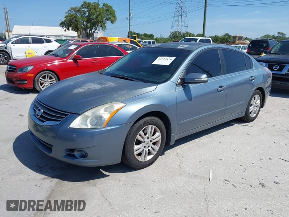 2011 Nissan Altima 2.5 S with VIN 1N4AL2AP6BN421591, listed as a IAAI auction lot 42122870 with 148,897 mi miles. Bid and sale history available at carsss.com. Image 2.