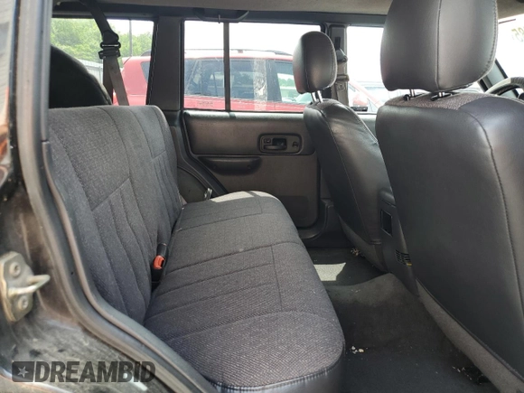 2000 Jeep Cherokee Classic with VIN 1J4FF58S8YL119611, listed as a Copart auction lot 57255685 with 148,908 mi miles and Clean title. Bid and sale history available at DreamBid. Image 11.