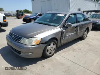 2003 Toyota Avalon XL z VIN 4T1BF28B93U300217, wystawiony jako Copart lot #54517515 z przebiegiem 243 415 mil mil oraz Szkoda całkowita • Salvage title. Historia ofert i sprzedaży dostępna na DreamBid. Obrazek 1.