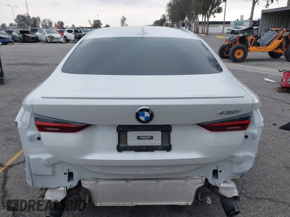 2022 BMW 4 Series 430i with VIN WBA53AP02NCK91287, listed as a IAAI auction lot 41448686 with 27,046 mi miles and . Bid and sale history available at carsss.com. Image 17.