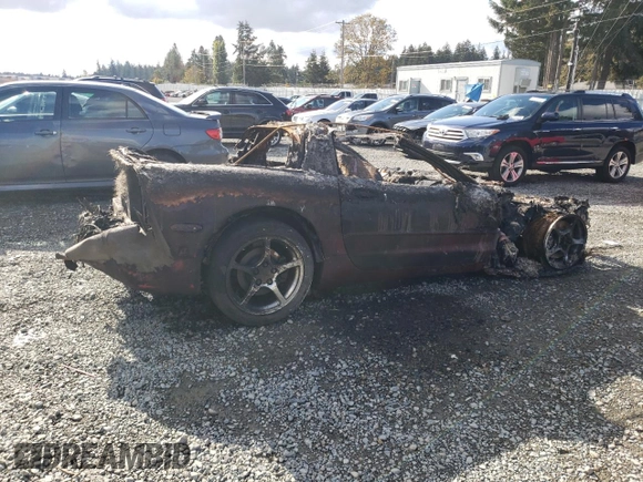 2002 Chevrolet Corvette with VIN 1G1YY22G225117384, listed as a Copart auction lot 77211944 with 0 mi miles and Salvage Title. Bid and sale history available at carsss.com. Image 3.