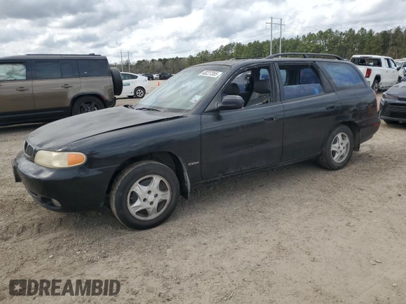 1999 Daewoo Nubira CDX z VIN KLAJB82Z5XK301054, wystawiony jako Copart lot #48227355 z przebiegiem 66 730 mil mil oraz Szkody całkowita. Historia ofert i sprzedaży dostępna na DreamBid. Obrazek 1.