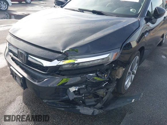 2021 Honda Clarity Touring z VIN JHMZC5F3XMC001253, wystawiony jako IAAI lot #42212102 z przebiegiem 35 649 mil mil oraz . Historia ofert i sprzedaży dostępna na DreamBid. Obrazek 6.