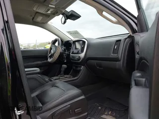 2016 GMC Canyon 4WD SLT z VIN 1GTG6DE36G1374639, wystawiony jako IAAI lot #42024354 z przebiegiem 61 752 mil mil oraz . Historia ofert i sprzedaży dostępna na DreamBid. Obrazek 5.