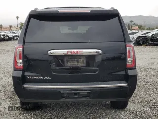 2016 GMC Yukon XL Denali with VIN 1GKS2HKJ1GR199710, listed as a Copart auction lot 49172615 with 261,856 mi miles and Salvage Title. Bid and sale history available at DreamBid. Image 6.