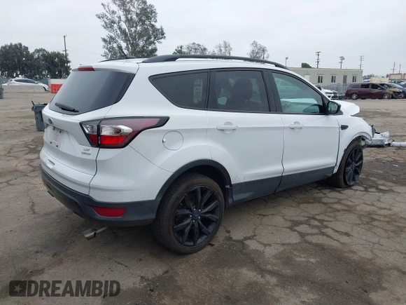 2017 Ford Escape SE with VIN 1FMCU0GD0HUD77275, listed as a IAAI auction lot 41890360 with 94,914 mi miles. Bid and sale history available at carsss.com. Image 4.
