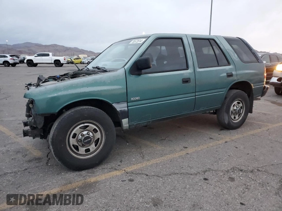 1996 Isuzu Rodeo z VIN 4S2CK58E1T4331031, wystawiony jako Copart lot #78573514 z przebiegiem 218 994 mil mil oraz Szkody całkowita. Historia ofert i sprzedaży dostępna na DreamBid. Obrazek 1.