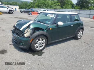 2011 MINI Hardtop with VIN WMWSU3C51BTX95581, listed as a Copart auction lot 60443995 with 157,213 mi miles and Salvage title. Bid and sale history available at DreamBid. Image 1.