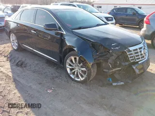 2015 Cadillac XTS Luxury with VIN 2G61N5S34F9226182, listed as a IAAI auction lot 41554394 with 119,194 mi miles and . Bid and sale history available at carsss.com. Image 1.