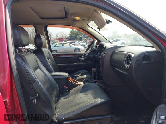 2005 GMC Envoy SLE with VIN 1GKDT13S252127604, listed as a IAAI auction lot 41898390 with 210,655 mi miles. Bid and sale history available at carsss.com. Image 5.