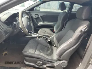 2007 Hyundai Tiburon GS z VIN KMHHM66D47U243846, wystawiony jako Copart lot #57509725 z przebiegiem 181 941 mil mil oraz Szkoda całkowita • Salvage title. Historia ofert i sprzedaży dostępna na DreamBid. Obrazek 7.