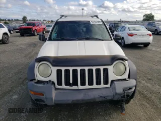 2002 Jeep Liberty Sport with VIN 1J4GL48K92W351230, listed as a Copart auction lot 51274195 with 211,716 mi miles and Salvage Title. Bid and sale history available at carsss.com. Image 5.