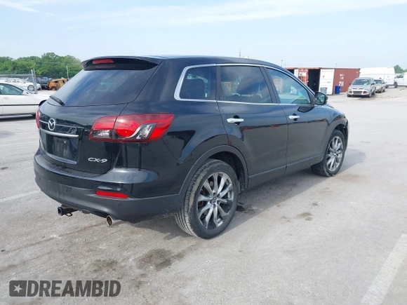 2015 Mazda CX-9 Grand Touring z VIN JM3TB2DA1F0456773, wystawiony jako IAAI lot #42257555 z przebiegiem 152 890 mil mil oraz . Historia ofert i sprzedaży dostępna na DreamBid. Obrazek 4.