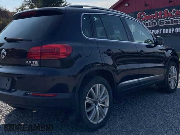 2013 Volkswagen Tiguan SE z VIN WVGBV7AX3DW544490, wystawiony jako Copart lot #82038874 z przebiegiem 149 169 mil mil oraz Czysty tytuł • Clean title. Historia ofert i sprzedaży dostępna na DreamBid. Obrazek 4.