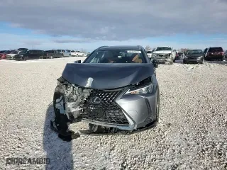 2021 Lexus UX with VIN JTHX9JBH8M2047296, listed as a Copart auction lot 87916535 with 10,297 mi miles and Salvage Title. Bid and sale history available at carsss.com. Image 10.