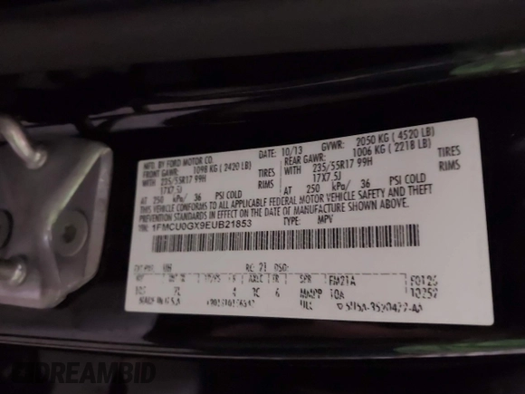 2014 Ford Escape SE with VIN 1FMCU0GX9EUB21853, listed as a IAAI auction lot 40313063 with 106,687 mi miles. Bid and sale history available at carsss.com. Image 9.