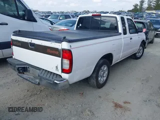 1999 Nissan Frontier XE with VIN 1N6DD26SXXC324508, listed as a IAAI auction lot 41521674 with 297,239 mi miles and . Bid and sale history available at DreamBid. Image 4.