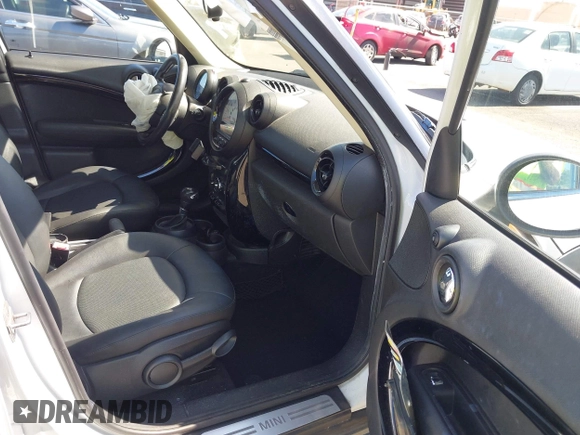 2013 MINI Countryman with VIN WMWZB3C52DWR35806, listed as a IAAI auction lot 42184010 with 93,380 mi miles and . Bid and sale history available at DreamBid. Image 5.